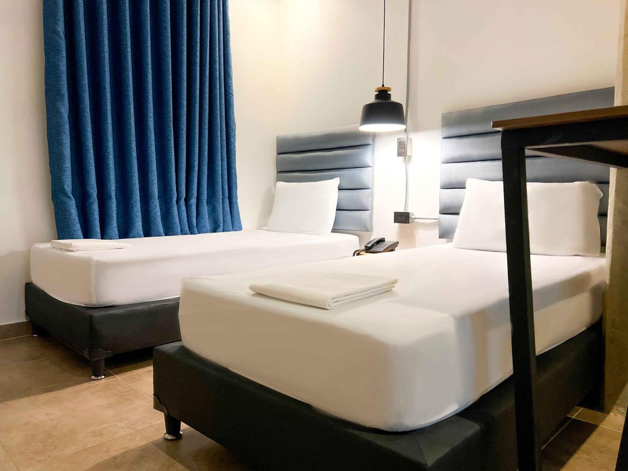 Apartahotel Medellin Bagian luar foto